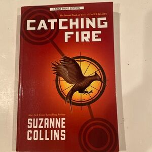 “Catching Fire,” The second book of the Hunger Games. Paperback, LARGE PRINT